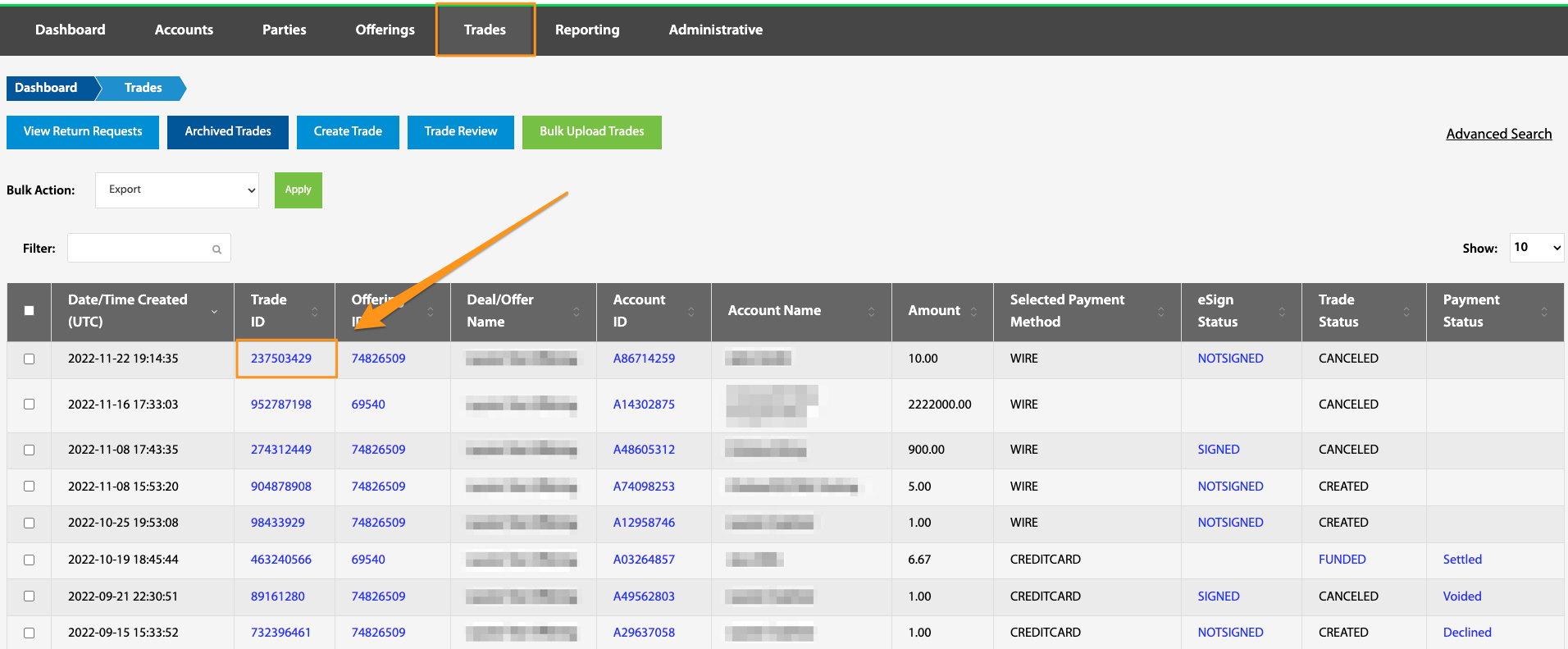 Trades table with an arrow pointing to a Trade ID hyperlink